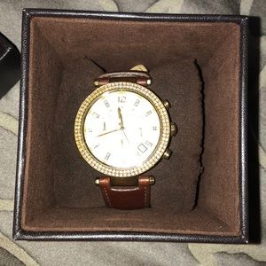 Michael Kors watch . Brown leather with gold